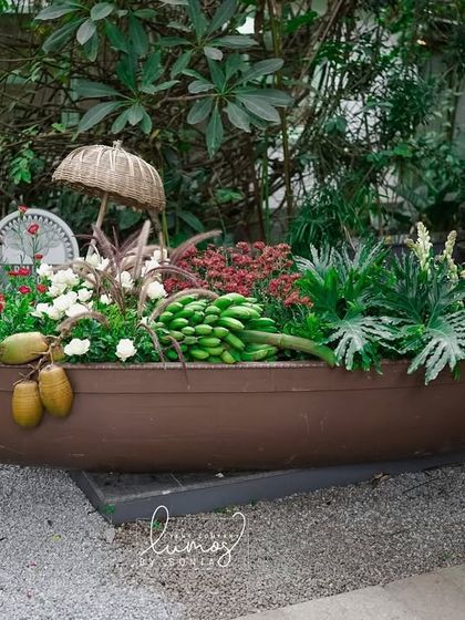A wider view of the Cochin-inspired boat installation, showcasing its unique blend of natural elements and cultural storytelling.