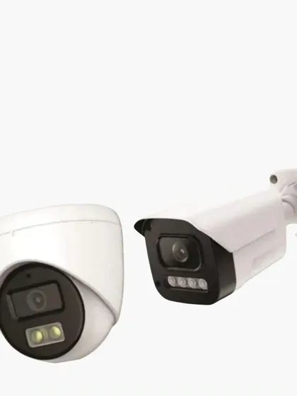 On the left is a dome camera with built-in spotlights, and on the right is a bullet camera with multiple infrared LEDs. Both are designed for superior night-time performance.