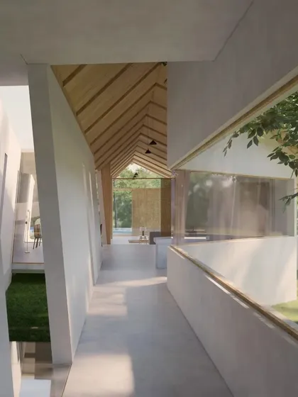 A corridor in the Cumin Residence is designed as a viewing gallery, with a long, horizontal window at eye level offering curated glimpses of the garden.