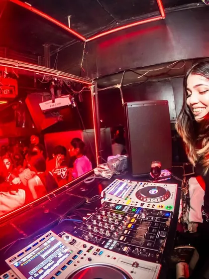 The red lights and packed dance floor at Underground, The HHI. These are the nights I live for, playing a mix of techno and house music.