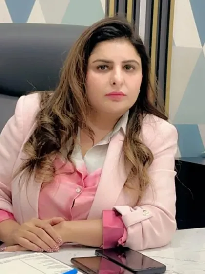 Dr. Ritu during a consultation. We believe in a personalized approach, taking the time to understand each client's goals to create a tailored treatment plan.