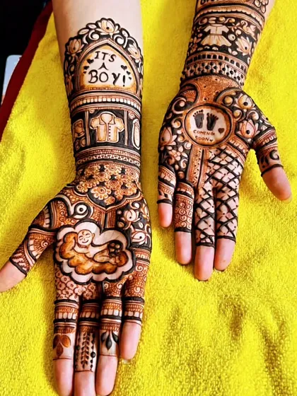 Celebrating a new arrival? I design special baby shower mehndi with cute motifs like this "It's a Boy!" announcement, a sleeping baby, and tiny footprints. It’s a unique way to make your godh bharai ceremony even more memorable.