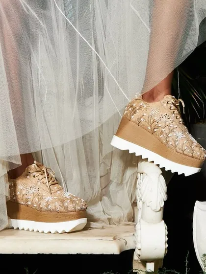 For the bride who values comfort as much as style, these embellished platform sneakers are a game-changer. Dance the night away without compromising on glamour.