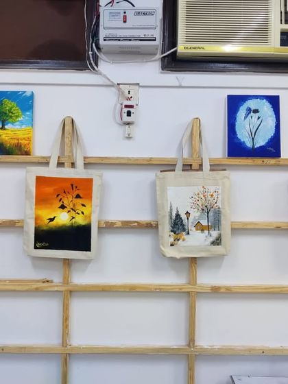 The beautiful results of our tote bag and canvas painting workshop for AIIMS doctors, displayed in our studio. Each piece is a unique expression of creativity.
