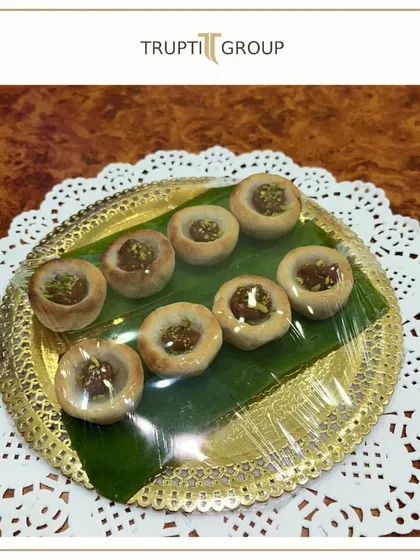 A tray of our beautifully crafted dry fruit mithai, perfect for gifting or as part of a grand dessert buffet.