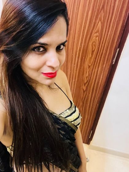 Another angle of the black and gold party wear saree. The thin straps and fitted blouse are designed to create a chic and sophisticated silhouette for any evening event.