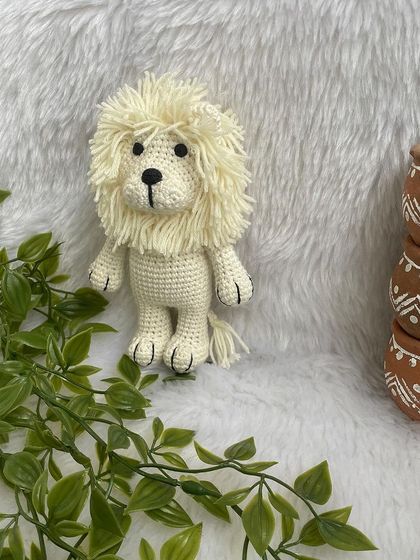 The Lion King in a soft cream color. This was my first time making him in white, and I think he looks so gentle and majestic. A perfect gender-neutral gift for a newborn.