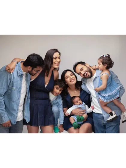 Laughter and love fill this extended family portrait. Our goal is to create a relaxed environment where genuine family moments can unfold naturally.