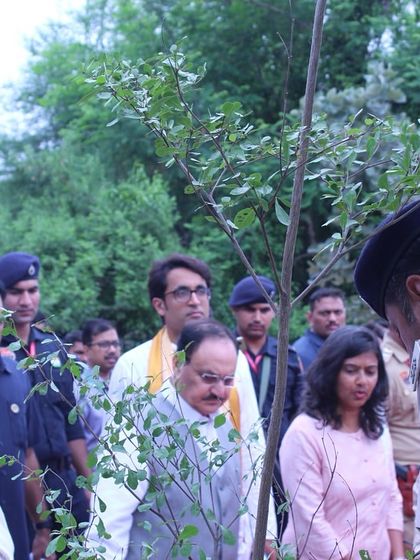 Dignitaries and officials tour the restored Badshahpur Forest Corridor, observing the thriving native species that have transformed this once-barren stretch.