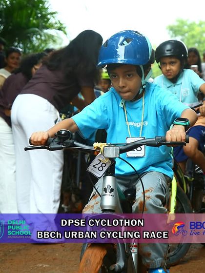 The race is on! A young rider bursts from the start line with incredible energy at the Urban Cycle Race, showcasing the competitive spirit of our junior events.