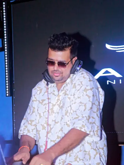 A close up shot of me working the mixer at Aura Night Club. Every knob and fader helps craft the sound for the night.