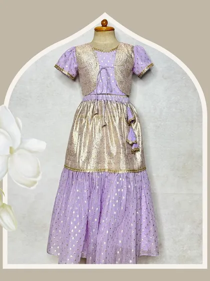 A beautifully styled shot of the lavender and gold lehenga set, perfect for Diwali or a family wedding.