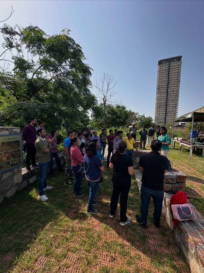 A group of NatWest employees gathers for a briefing at Ghata Bundh, many of them stunned to find such a thriving green space in the middle of concrete Gurgaon.