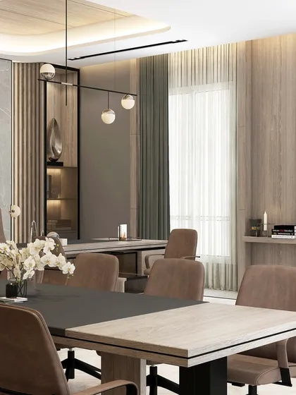A view of a luxury office interior, showing how we blend different zones seamlessly. The space includes a large meeting table, an executive desk, and a casual seating area, all unified by a sophisticated material palette of wood, marble, and soft textiles.
