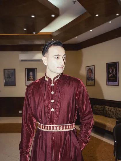 The "Duke of Delhi" look. A rich, maroon velvet outfit that feels both royal and modern.