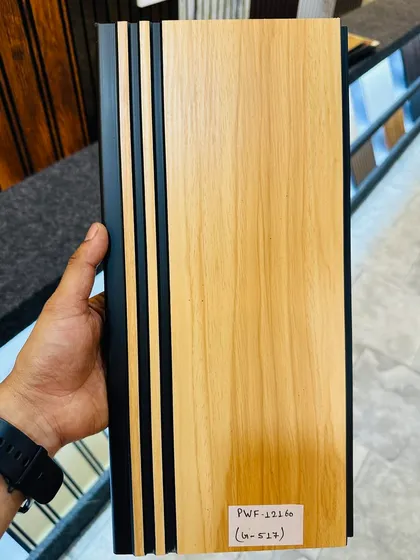 A classic combination of light wood grain fluted panel with black grooves. This design is versatile and works well in both modern and traditional interiors.