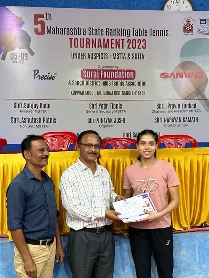 Ananya Chande receiving her Silver medal in the U-19 Category at the State Ranking TT Tournament in Sangli. Her consistency in reaching finals is a hallmark of a top player.