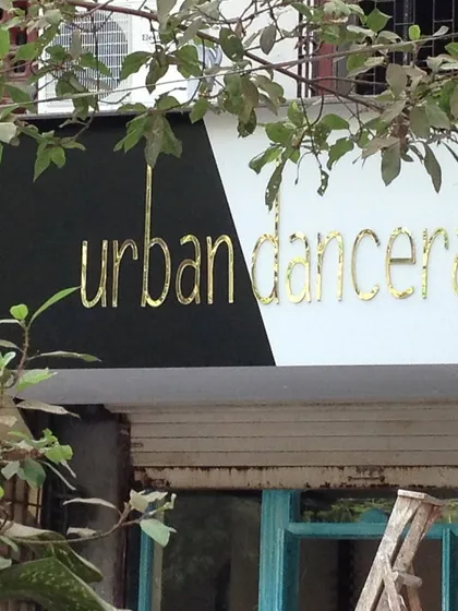 The sign of our first studio. This image is a nostalgic look at where it all began, a symbol of our growth over the past nine years.