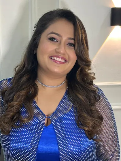 Another smiling portrait, capturing the joy and confidence of a client who feels her best.