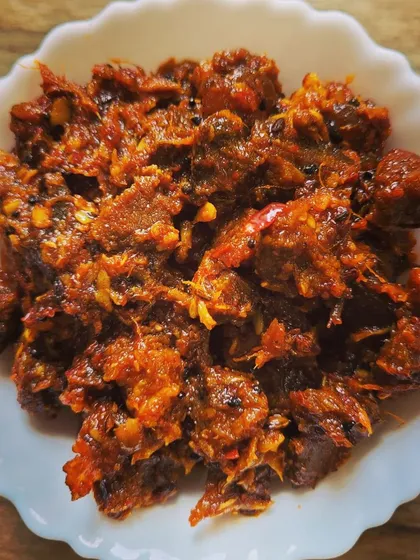 Here’s a close-up of my buff chunks spicy pickle. I use tender pieces of buff and a blend of homemade spices to create this rich and hearty pickle. I can also customize the spice level for you.