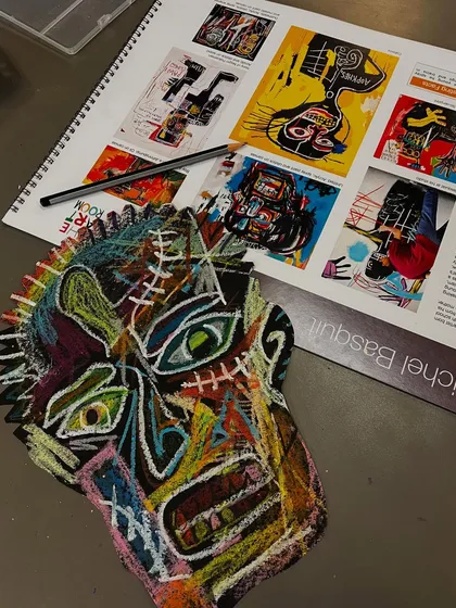 Another fantastic Basquiat-inspired head, created with a riot of color using oil pastels on a black cutout.