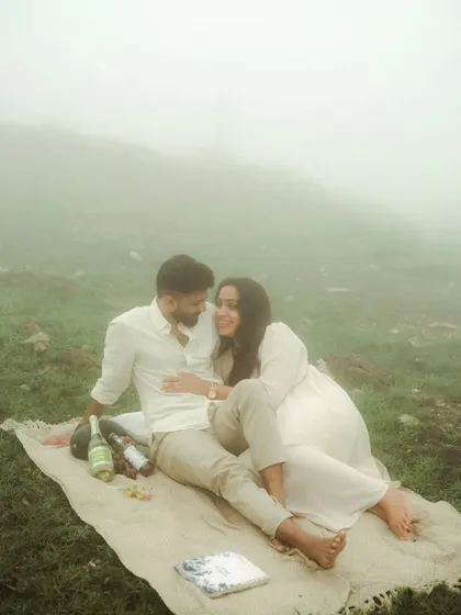 A love story wrapped in mist. For Treesa and Justin's pre-wedding session, we ventured into the hills for a dreamy picnic. This image captures the quiet, ethereal romance of the moment, showing how I use natural atmosphere to create soulful and cinematic couple portraits.