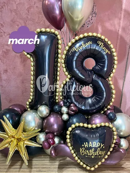 An 18th birthday is a major milestone, and we marked it with this chic and edgy balloon arrangement. The black and metallic purple balloons, gold-studded details, and personalized name make it a sophisticated choice.