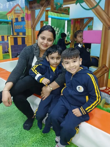 A teacher sits with her students in the My Burrow area. We ensure a safe and supervised environment for all school outings.