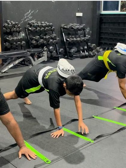 Balancing into a new week. This fun partner drill on the agility ladder challenges core strength and stability.