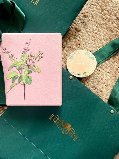 A beautiful gift box and bag designed around a Tulsi (Holy Basil) theme. The hand-appliquéd Tulsi illustration on the box and the gold-foiled Devanagari script create a thoughtful and culturally rich presentation.