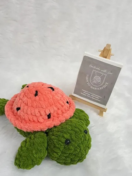 A single plush watermelon turtle.