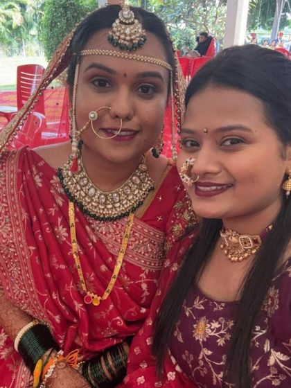 A beautiful moment between two of my clients. The bride is wearing a heavy green Kundan set, while her sister chose a lighter, elegant choker from my collection.