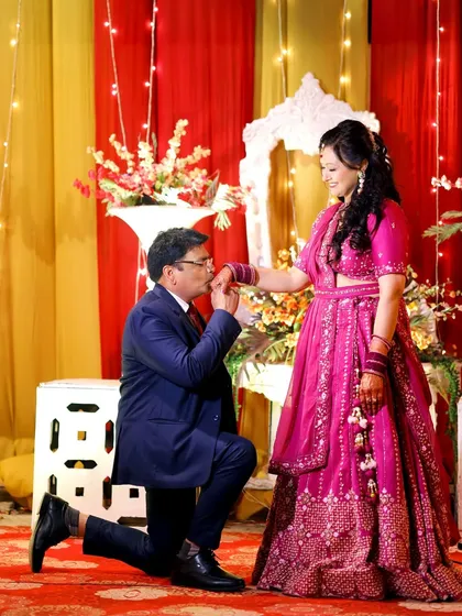A classic, romantic gesture captured during an anniversary celebration. I help couples relive their special milestones with timeless portraits like this.