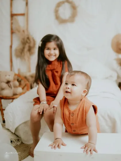 A big sister and her baby brother. This boho-themed sibling shoot captures the beginning of their lifelong friendship.