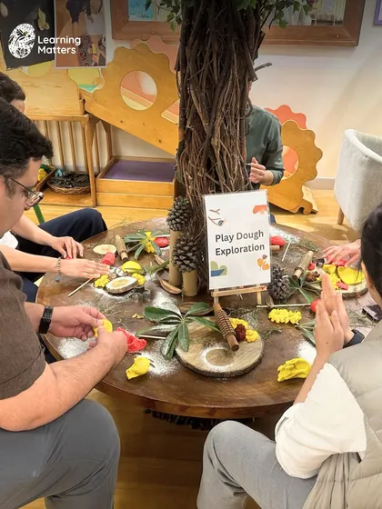 Our Parent Orientations are interactive experiences. Before children join, parents step into the classroom to engage with our Reggio-inspired invitations, gaining a deep, personal understanding of our play-based pedagogy.