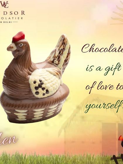 This version of my chocolate hen features white and dark chocolate details on its wing and tail, sitting in a milk chocolate basket.
