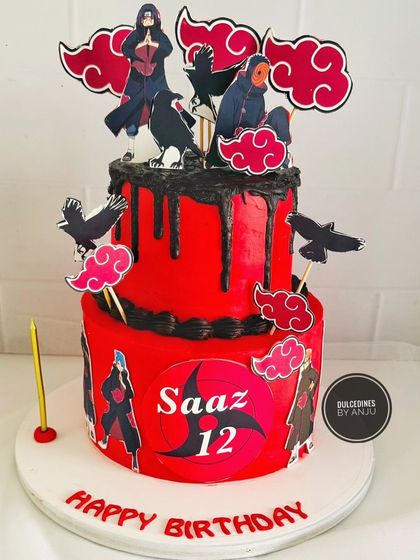 A dramatic two-tier Naruto-themed cake in bold red and black for a fan of the anime.