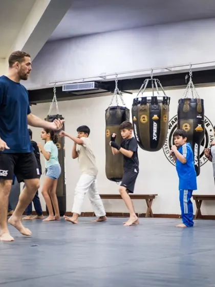 Our kickboxing class is all about building a strong foundation. Under the watchful eye of Coach Seth, students learn proper form for punches and kicks, developing coordination, balance, and confidence in their movements.