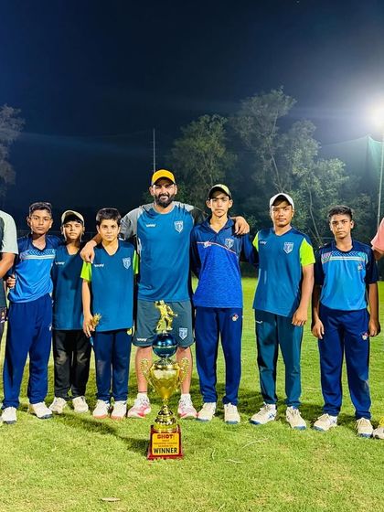 The core team with the winner's trophy. Proud of every single player's contribution.