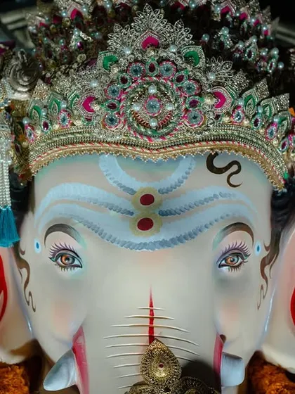 A detailed close-up of the Sanpadya Cha Maharaja idol. This shot highlights the intricate craftsmanship of the crown and the expressive eyes, showcasing my focus on capturing not just the big picture but also the small, artistic details.