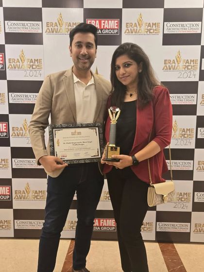 Posing with our trophy and certificate from the Era Fame Awards. We are grateful for this recognition and motivated to continue creating inspiring landscapes.