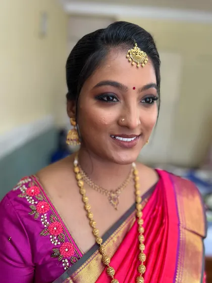 Niveditha looking serene and beautiful. The subtle makeup enhances her features without being overpowering.