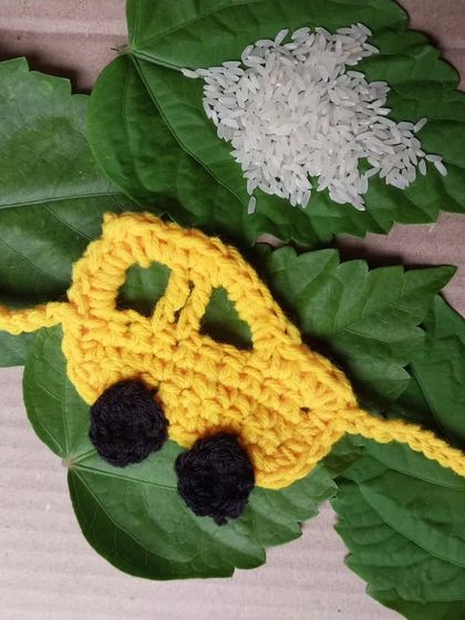 A fun car-shaped rakhi for the little automobile enthusiast. It's a playful design that stands out.