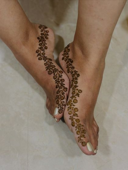 Another view of the delicate floral vine, showing how beautifully it adorns the feet.