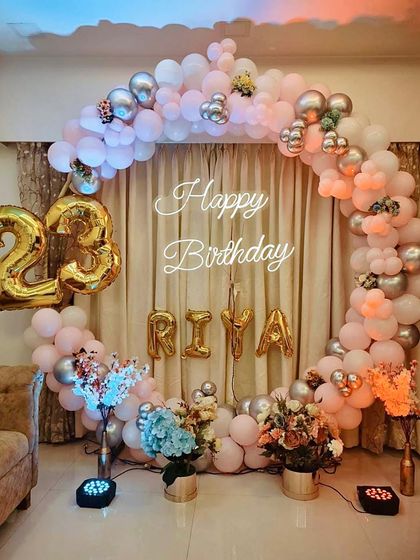 We love personalizing your celebrations. For this 23rd birthday, we used a pastel pink balloon ring backdrop, foil number balloons for the age, and letter balloons to spell out the birthday girl's name.
