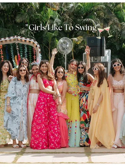 The bride and her squad having a blast at the pool party, because "Girls Like to Swing." 