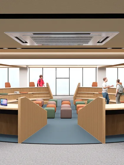 A tiered classroom at Heritage Xperiential Learning School with flexible seating in the center. This layout allows the space to be easily adapted for lectures, group discussions, or collaborative projects.