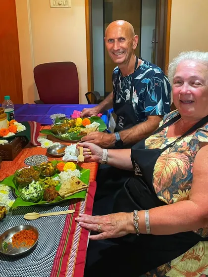 Hosting travellers from around the world is one of my greatest joys. Here, a lovely couple from abroad is enjoying a traditional meal on banana leaves, getting a true taste of Indian hospitality.