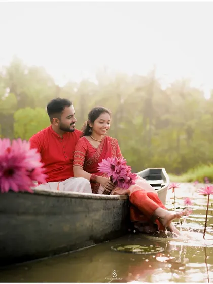 A relaxed pose, dipping her feet in the water. This captures a simple, serene moment of connection with each other and with nature.