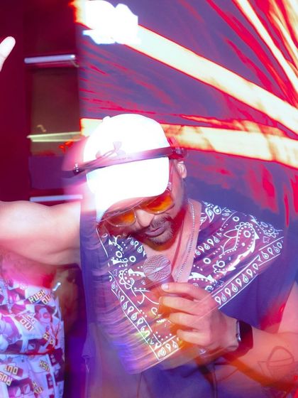 Tequila is my spirit animal. A high-energy shot of me with a mic in hand, ready to hype up the crowd.